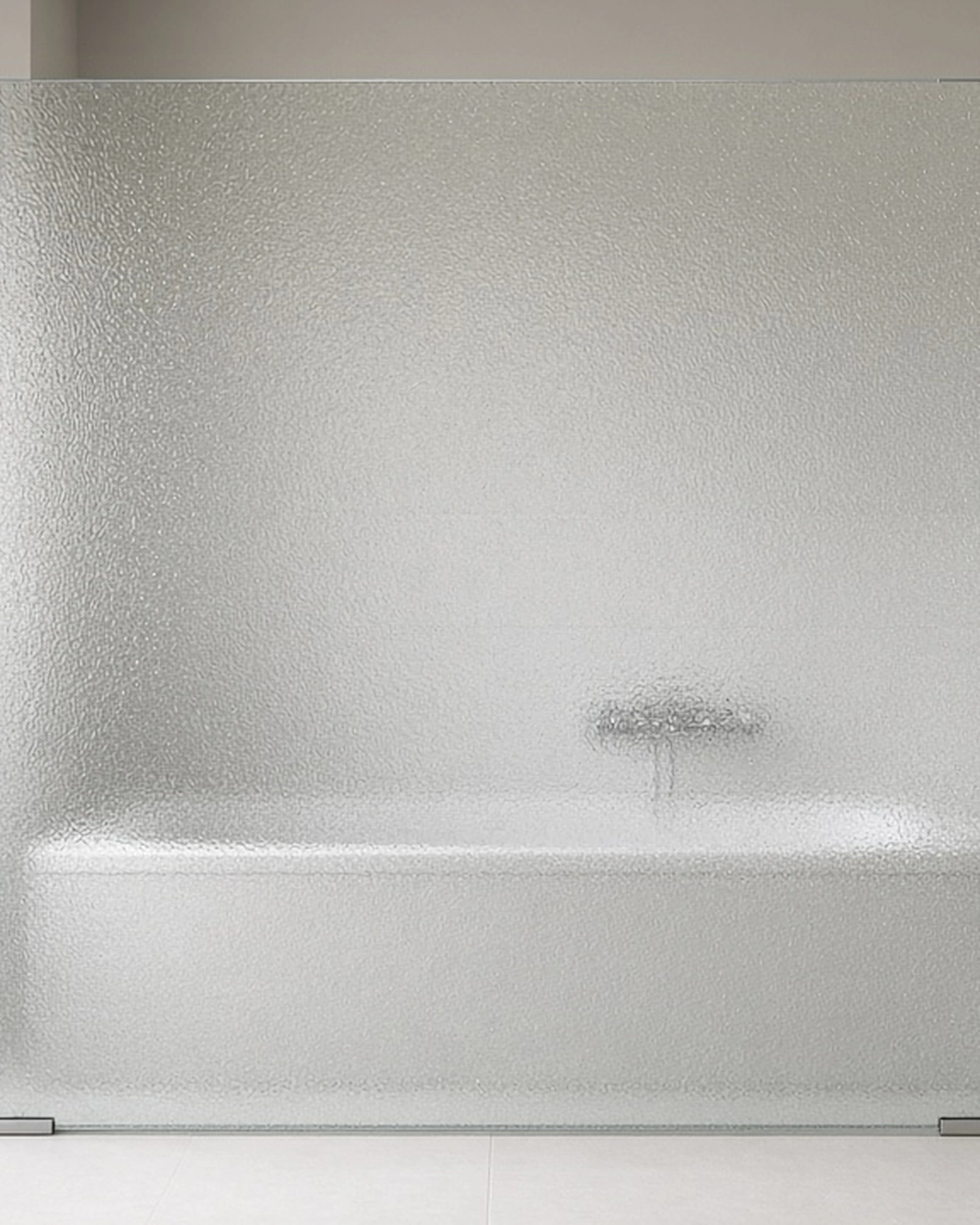 Stippolyte patterned glass bath screen in a family bathroom, illustrative render